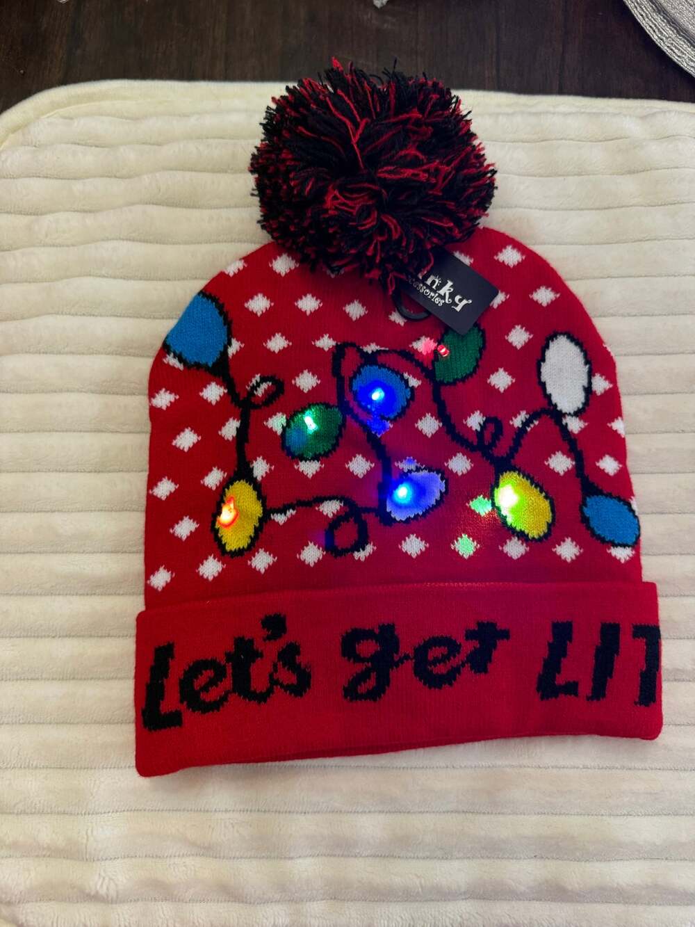 Red Christmas light beanie white diamond pattern and 'Let's get LIT' text Pompom